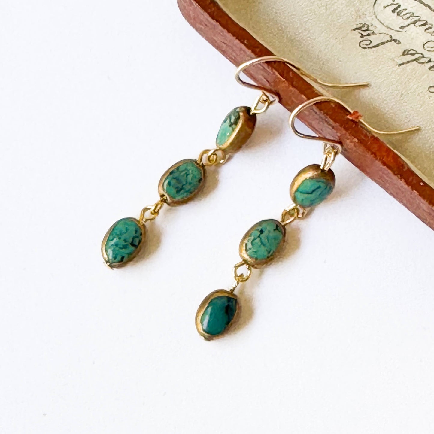 Long Authentic Turquoise dipped in gold dangly earrings